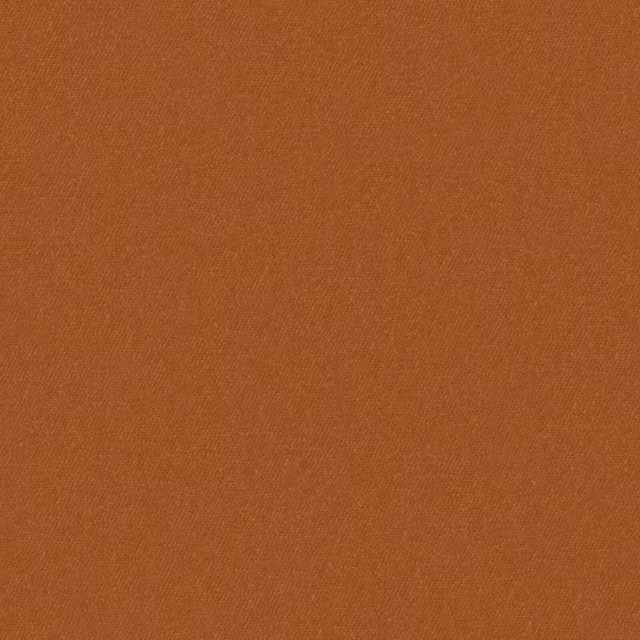 Warm ginger-brown plain woven textile showing a fine, subtly grainy surface