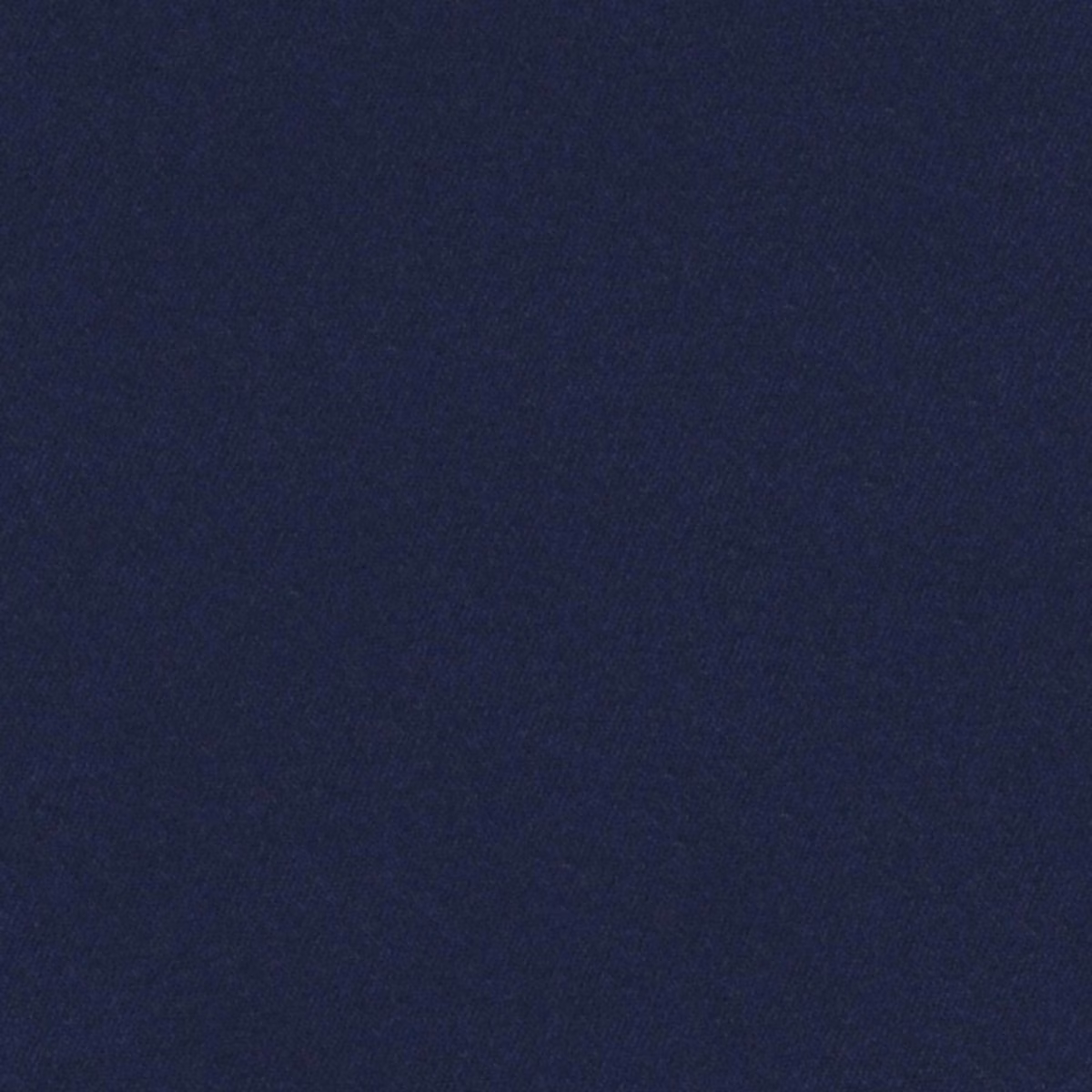 Close view of deep denim-blue fabric with a fine, subtly textured plain weave