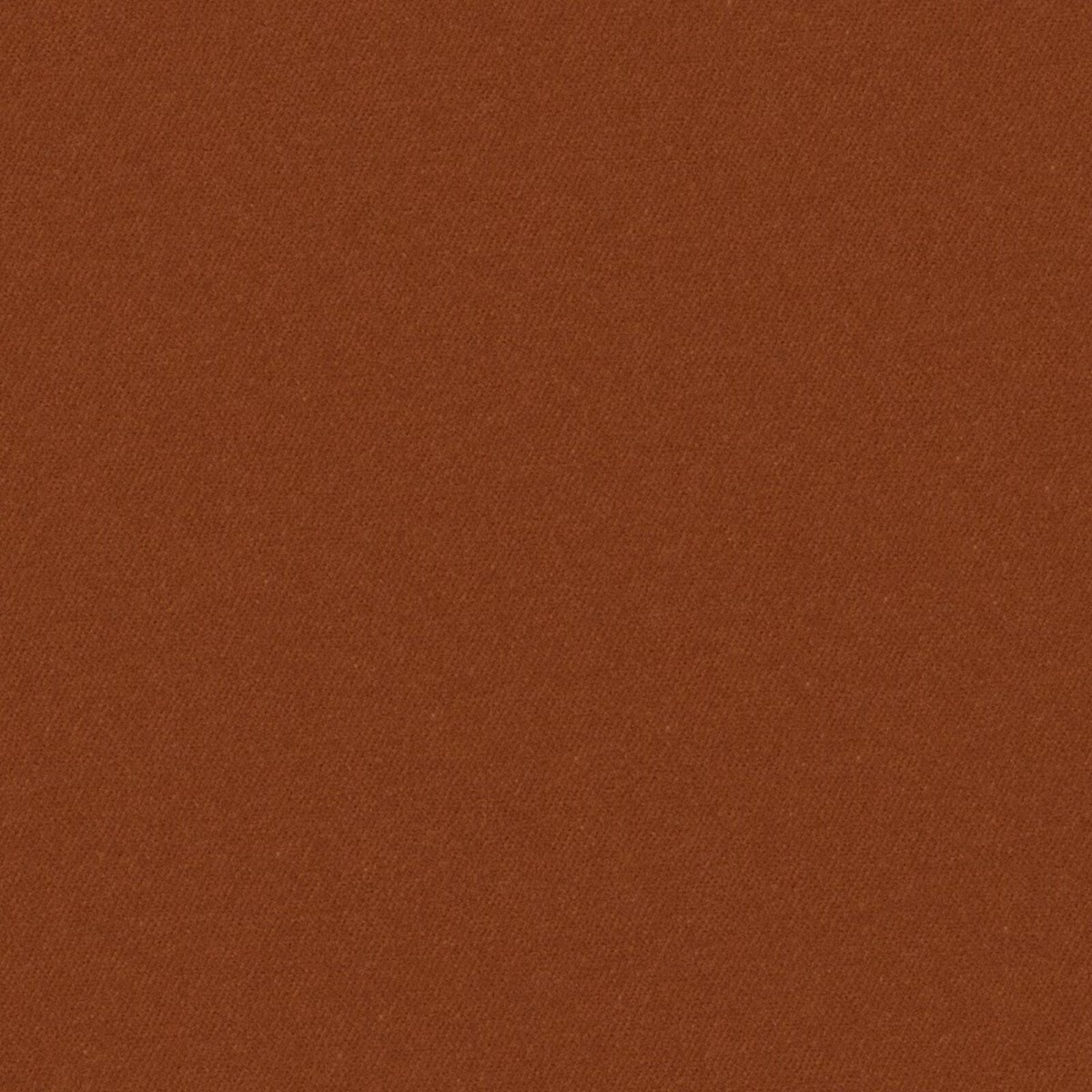 Close view of fine plain weave in warm burnt-rust terracotta fabric