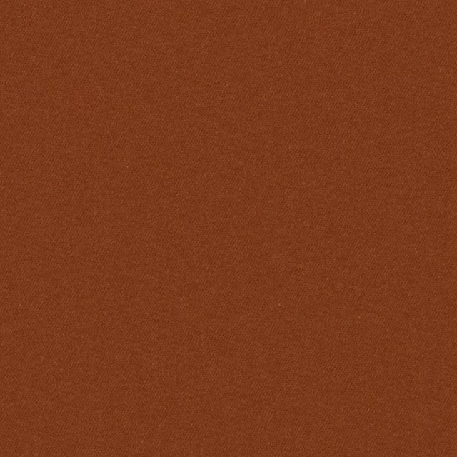 Close view of fine plain weave in warm burnt-rust terracotta fabric