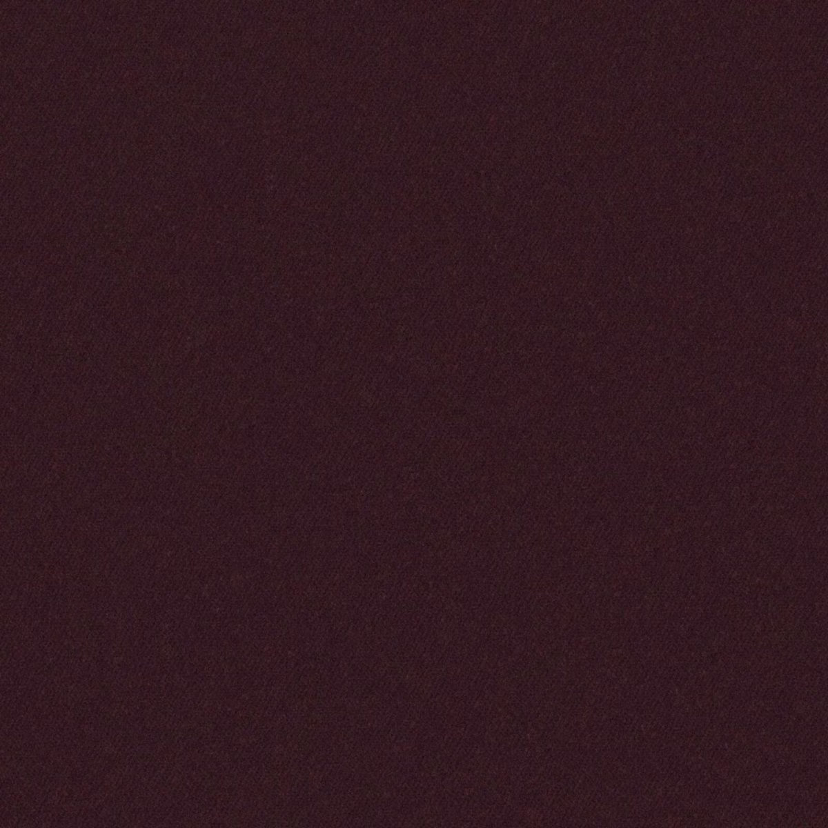 Close-up of deep blackberry plum fabric with a fine, subtly diagonal woven texture
