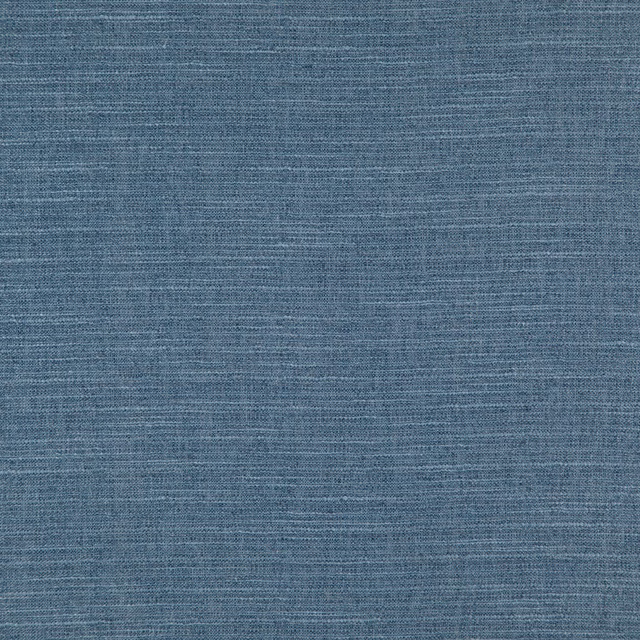 Close-up of muted cobalt-blue woven fabric with fine blue-grey textural variation