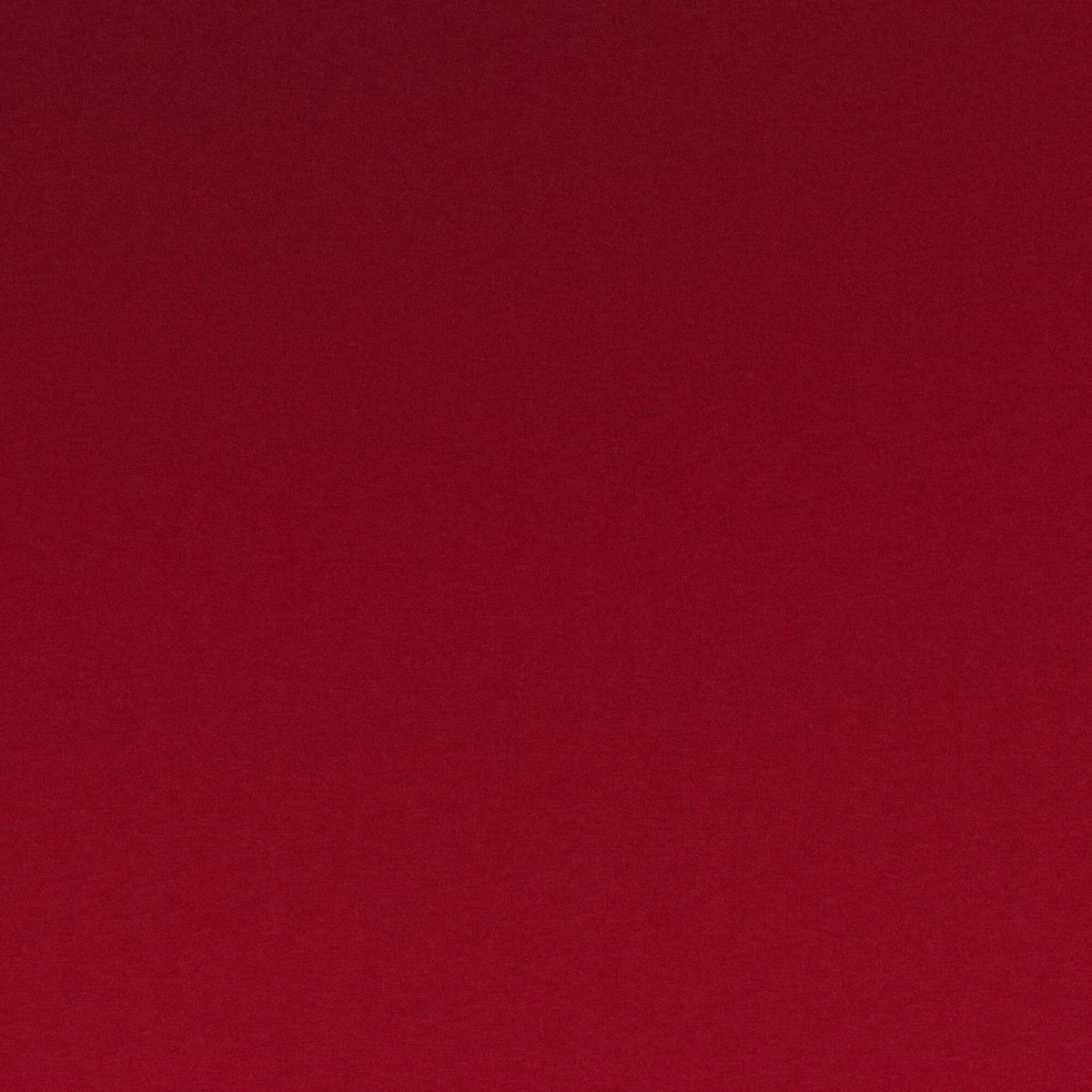 Deep scarlet red textile with a subtle, even woven surface