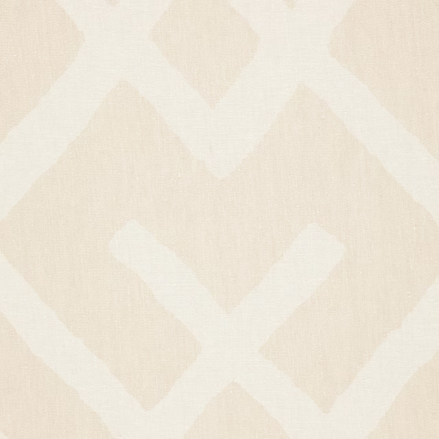 Warm sand and ivory woven fabric with a soft geometric trellis motif