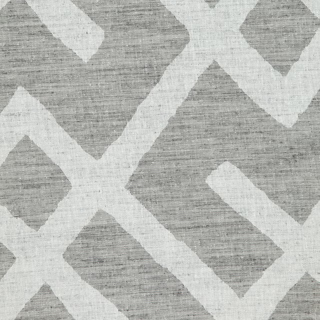 Smoky grey woven fabric with chalky ivory angular geometric lines and horizontal texture