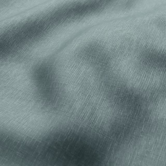 Muted seafoam teal fabric with fine weave and softly clouded tonal shading