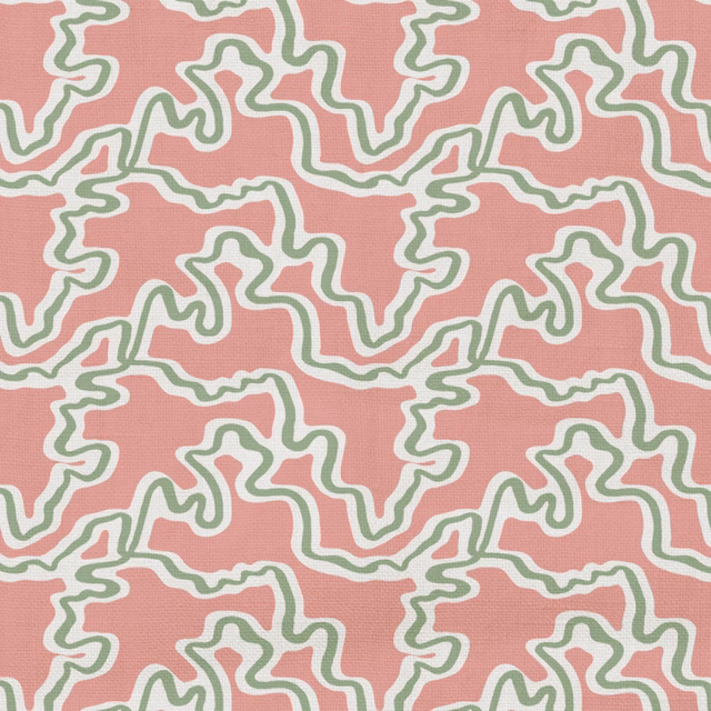 Watermelon-pink fabric with cream and sage-green irregular looping lines and fine texture