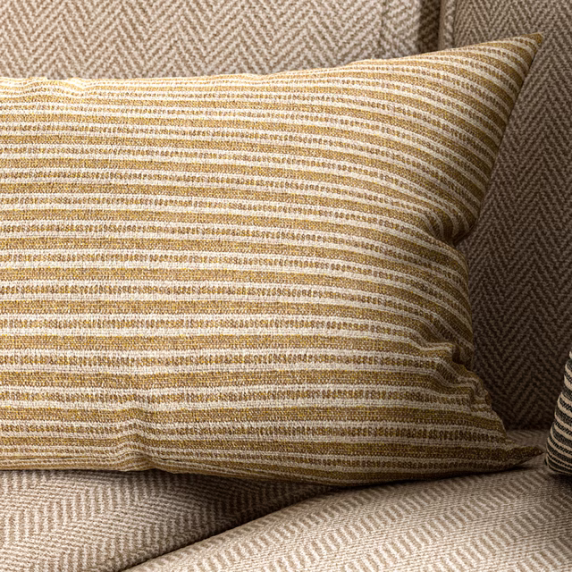 Warm citrine and ivory horizontal stripe woven cushion with softly nubby texture