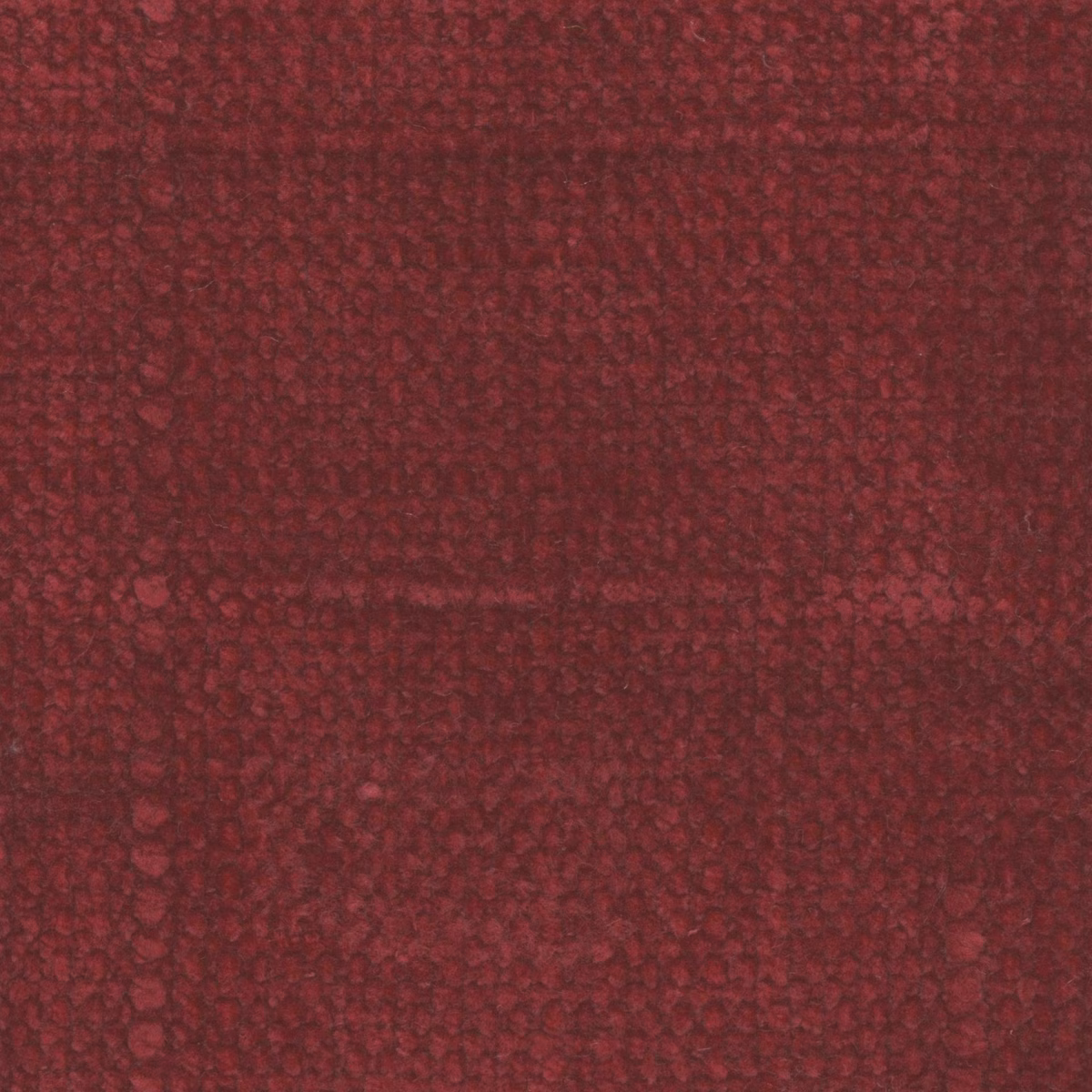 Close-up of dark cranberry red fabric with dense, irregular tonal texture
