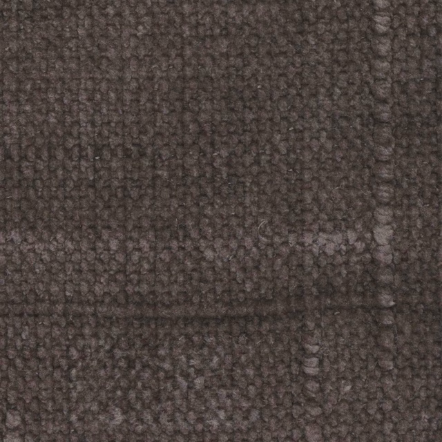 Close-up of deep driftwood taupe fabric with a dense, irregular nubby weave