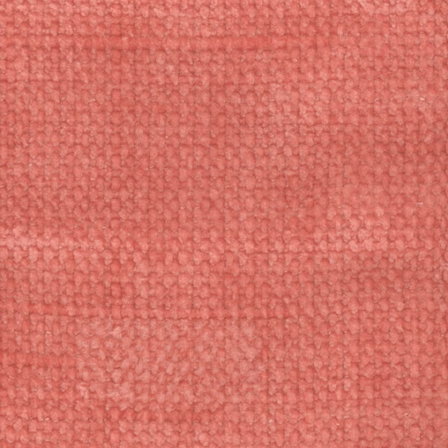 Close-up of coral lipstick-pink fabric with a small, nubby woven texture