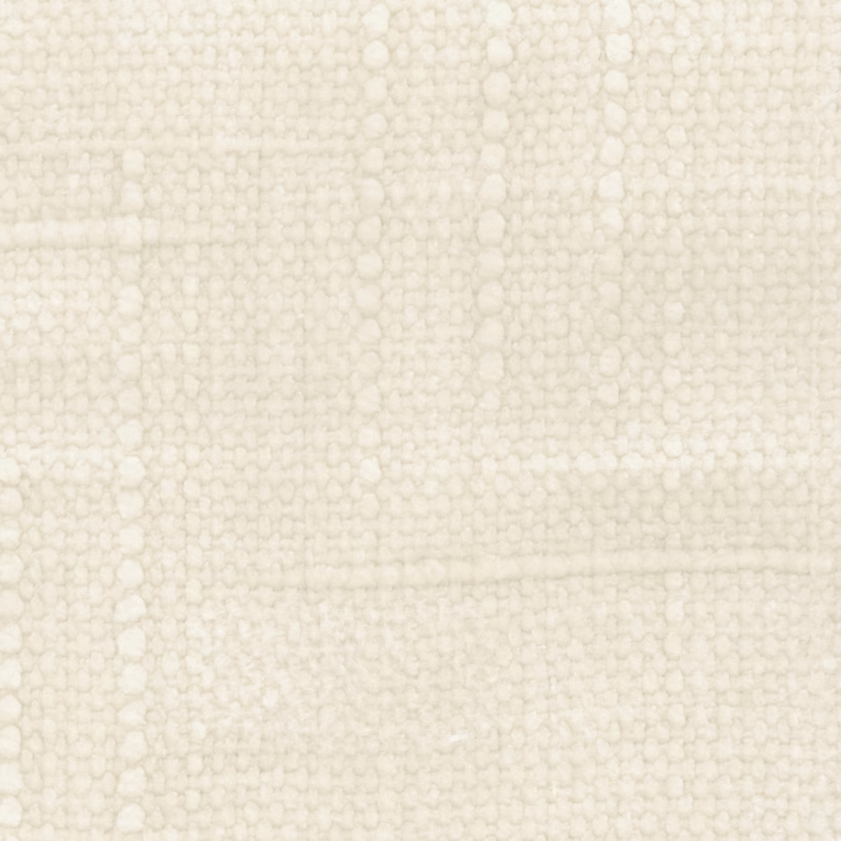 Close-up of pale marshmallow cream fabric with a softly irregular looped weave