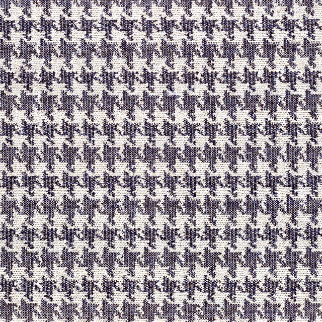 Close-up of Oxford blue and ivory woven micro houndstooth with flecked texture