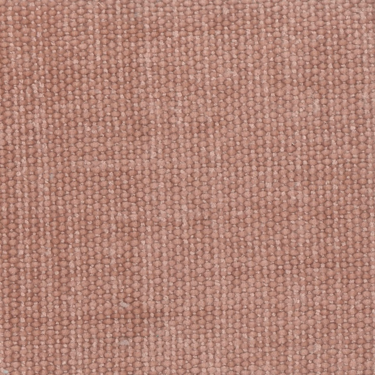 Close view of dusty blush-pink nubby weave with subtle vertical ribbing