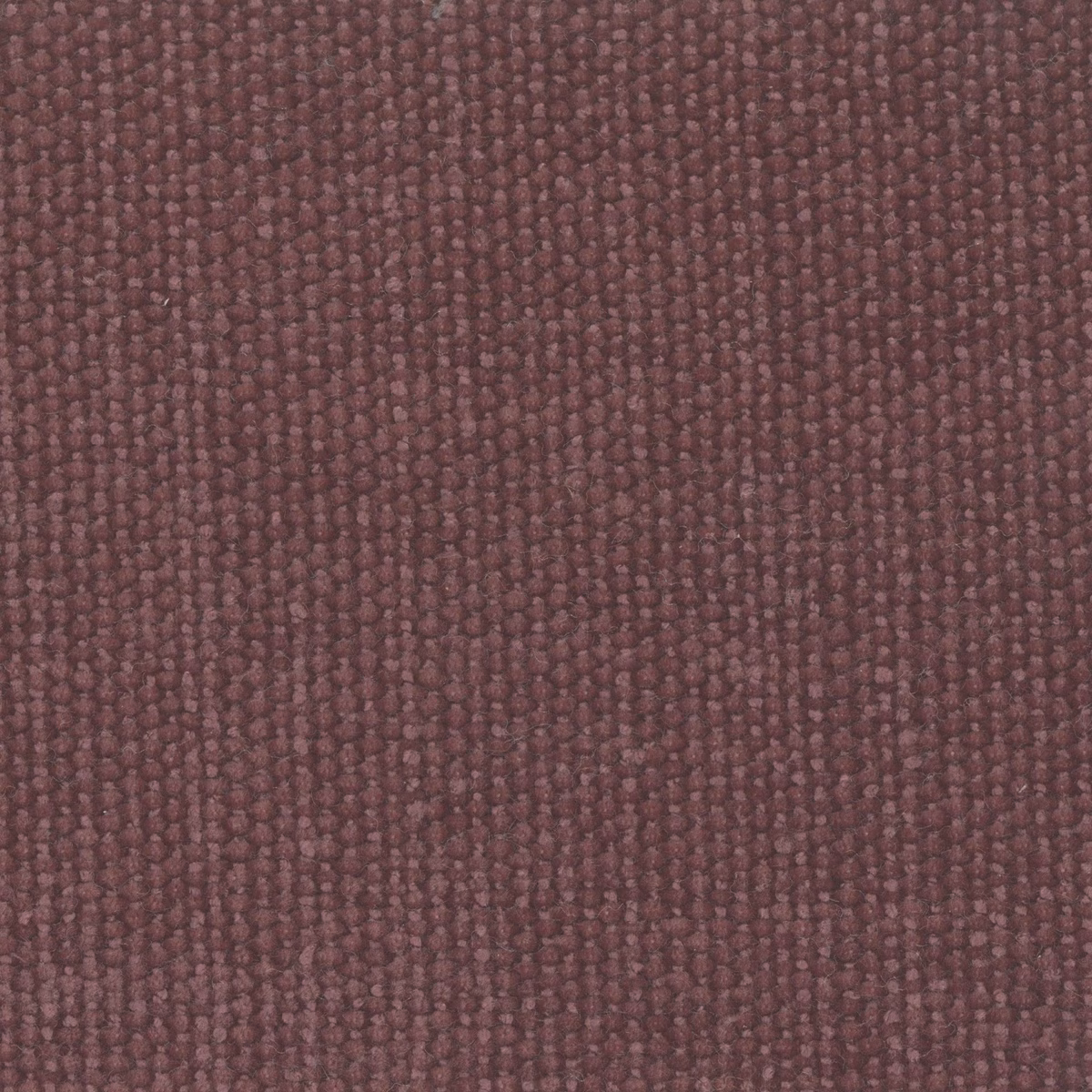Close-up of muted burgundy fabric with nubby vertical channels and plum undertones
