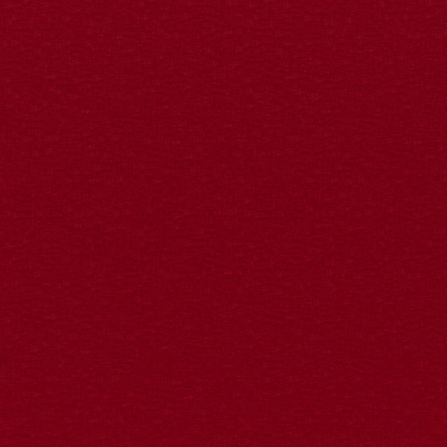 Deep berry-red plain woven fabric with a subtly varied, finely textured surface