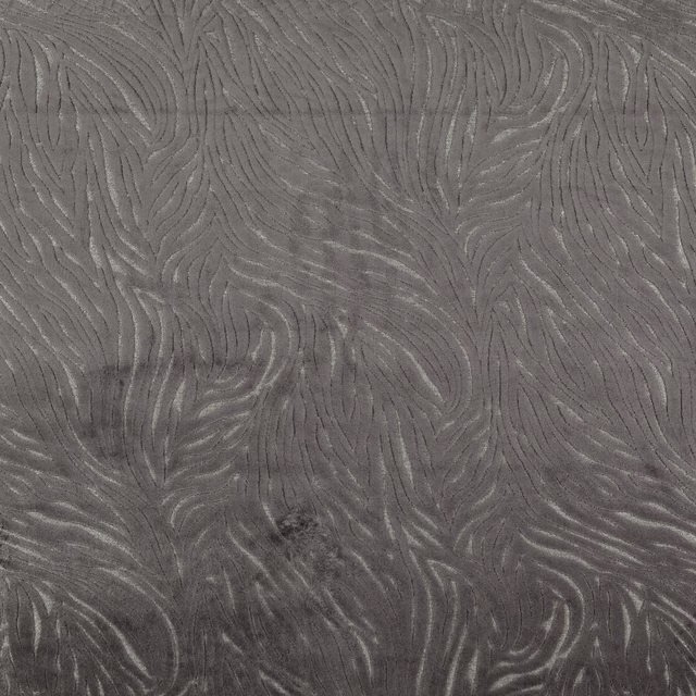 Dark raisin-grey fabric with softly raised, flowing feather-like lines and subtle sheen
