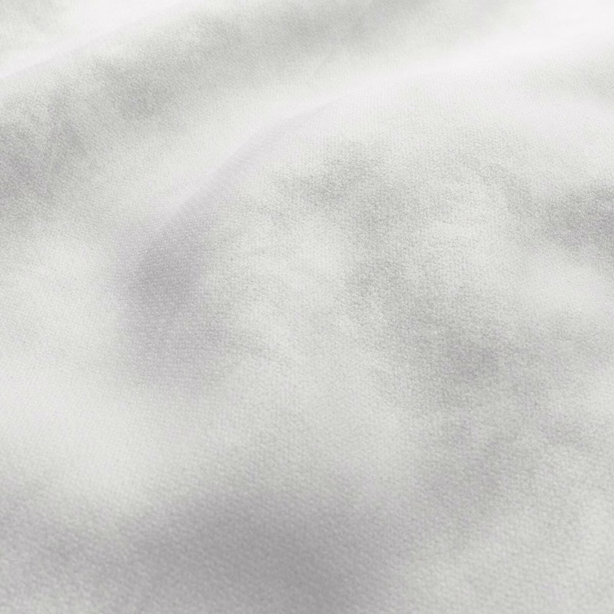 Snow white fabric with soft pale-grey clouding and a fine woven texture