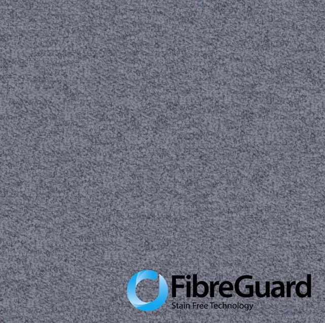 Close-up of cool dusk-blue fabric with dense, softly mottled textured surface