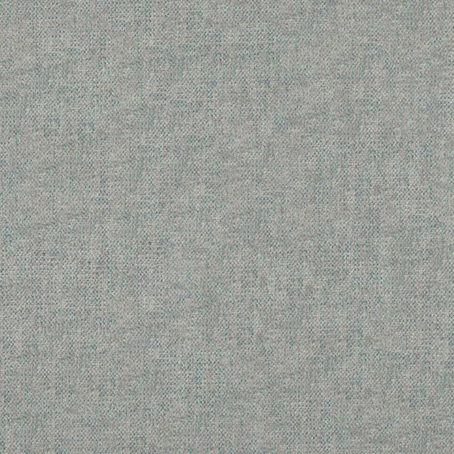 Close-up of pale spa blue-grey woven fabric with fine beige-grey mottling