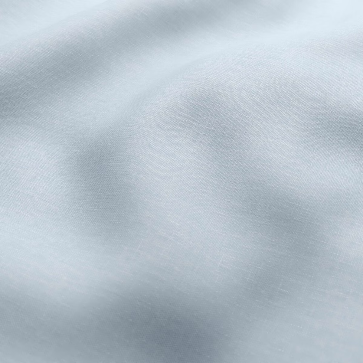 Pale sea-blue fine weave with cloudy tonal shading and soft sheen