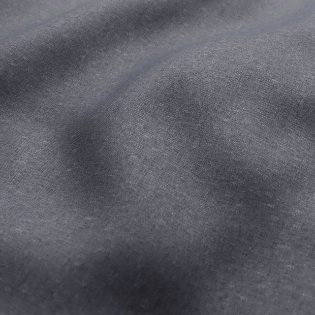 Deep elephant-grey woven fabric showing soft folds and subtle graphite tonal variation