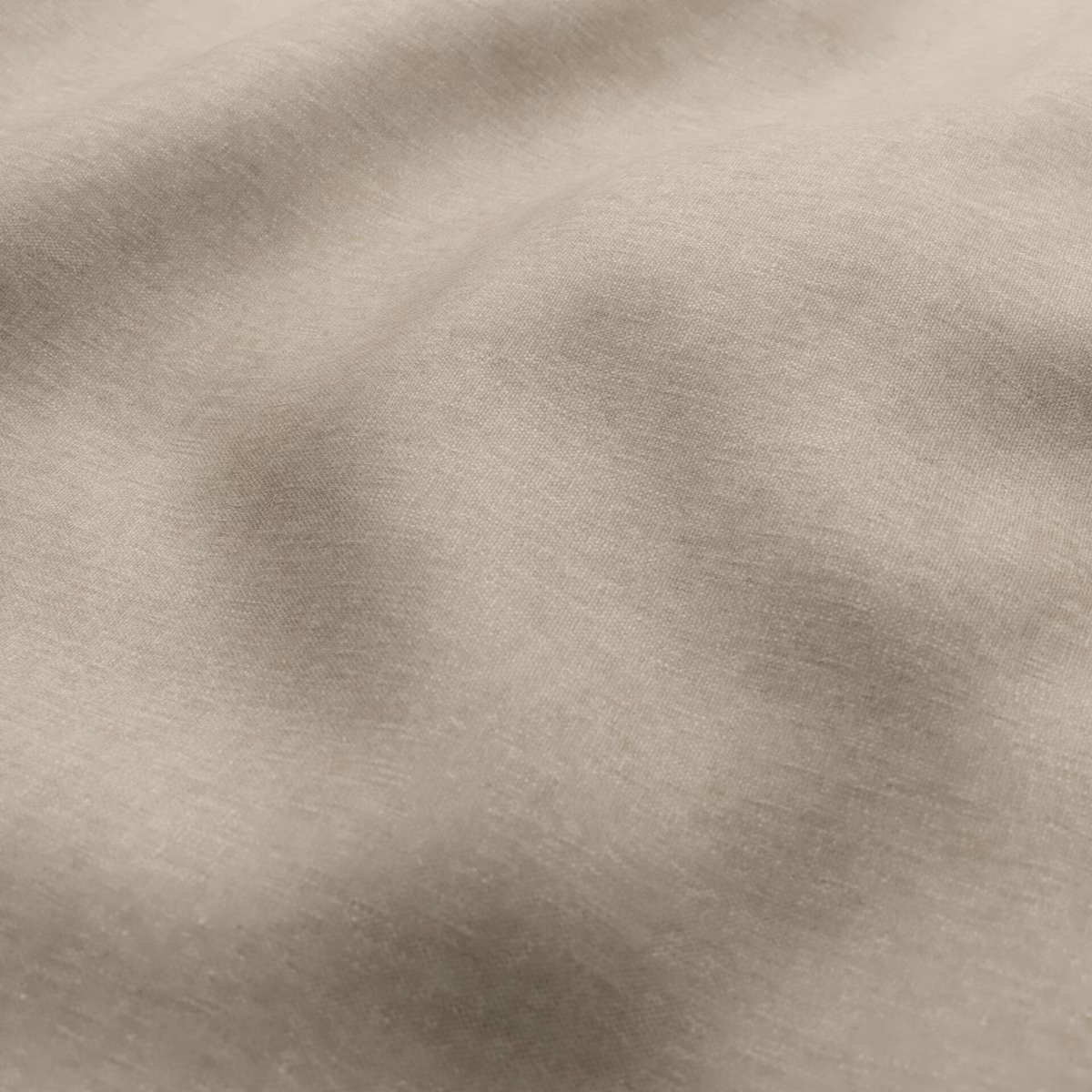 Warm taupe fabric with softly mottled shading and a fine woven texture
