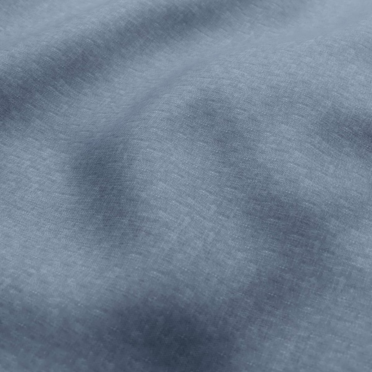 Close-up of blue-grey woven fabric with soft slate-toned cloudy variation