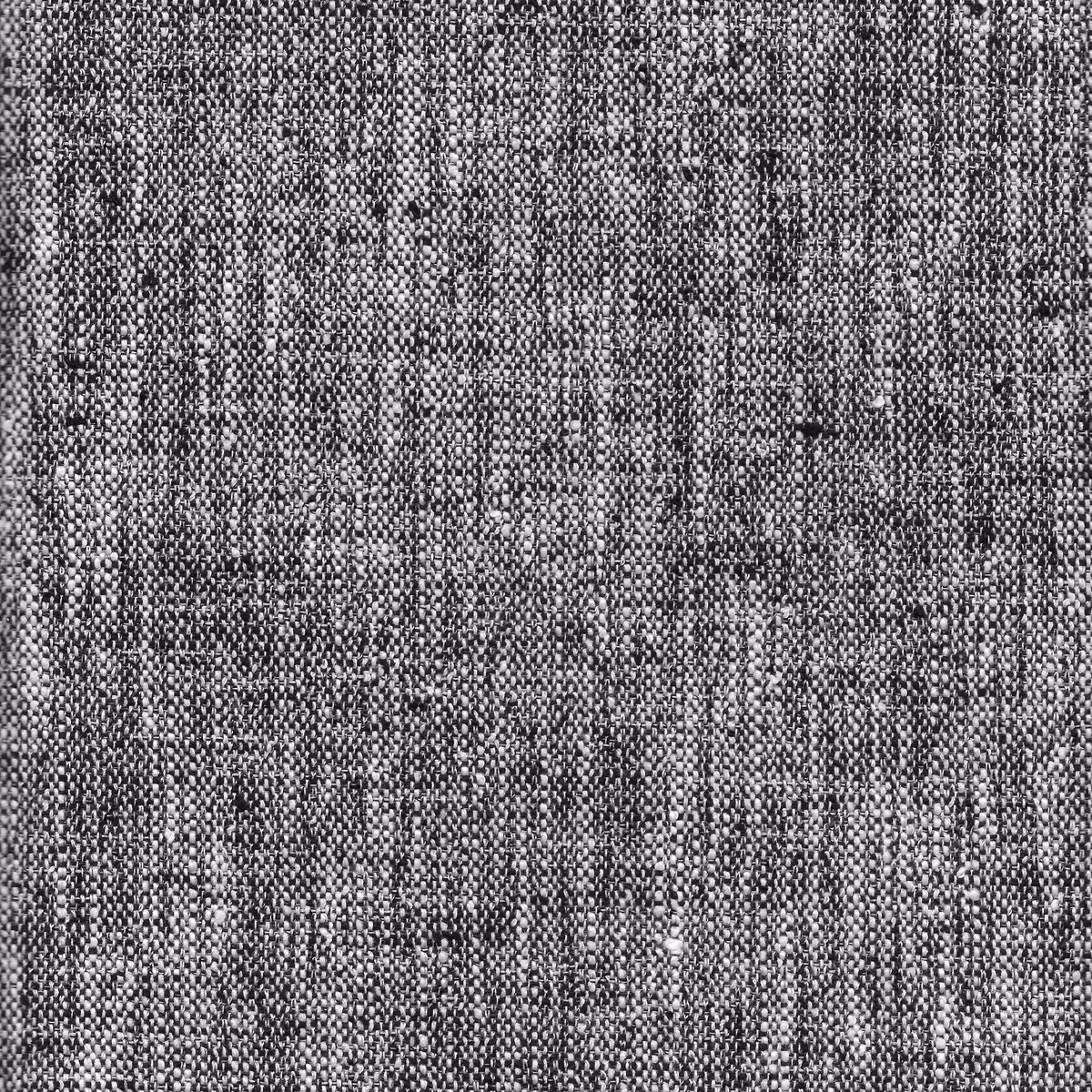 Close-up of charcoal and black woven fabric with pale grey flecks and irregular vertical texture