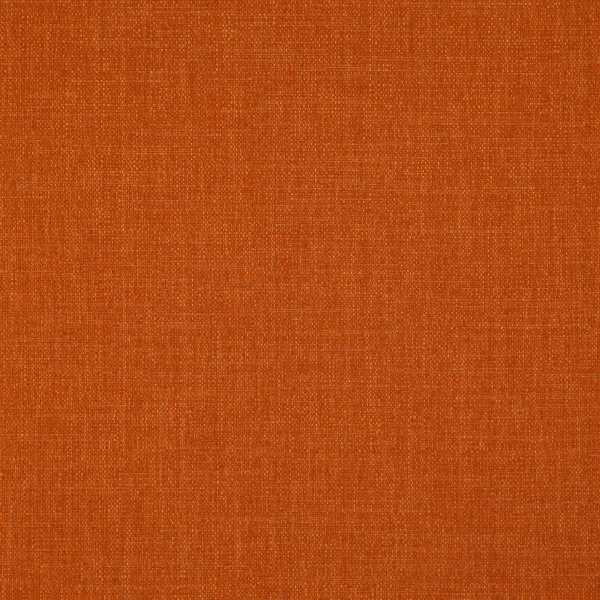 Close-up of warm paprika-orange plain weave with fine crosshatched texture