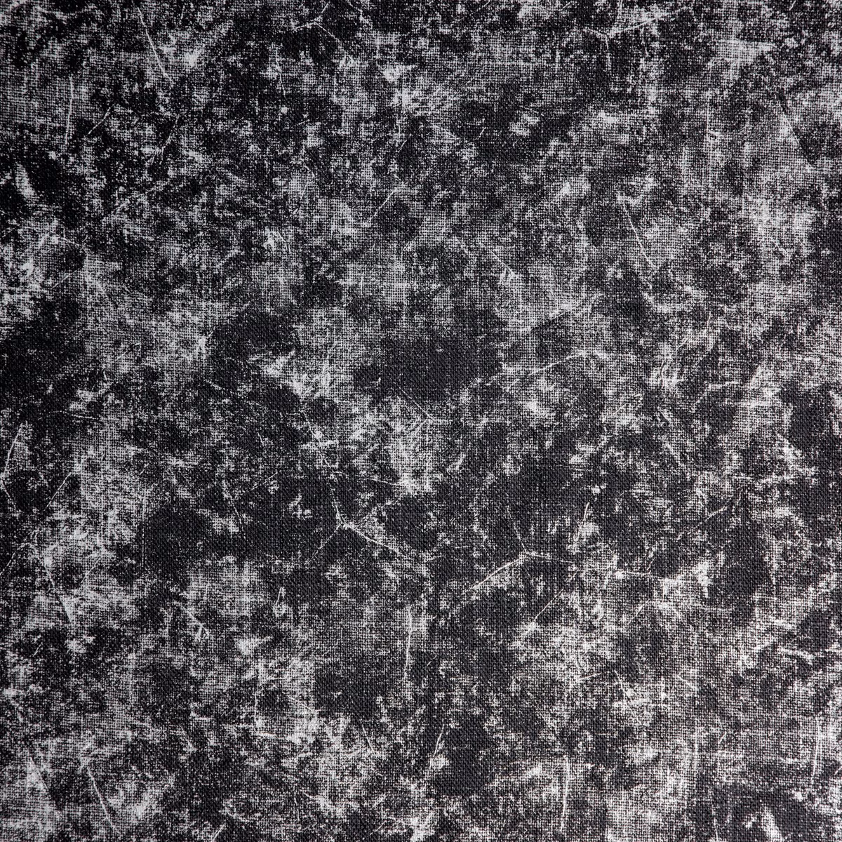 Charcoal-black textile with pale grey distressed marks and crosshatched woven texture