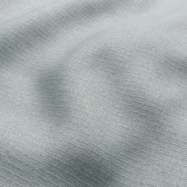 Pale lagoon blue-grey woven fabric with fine texture and soft ripples