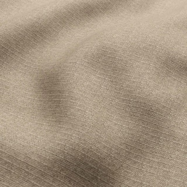 Warm beige Shetland fabric showing a fine plain weave in soft folds