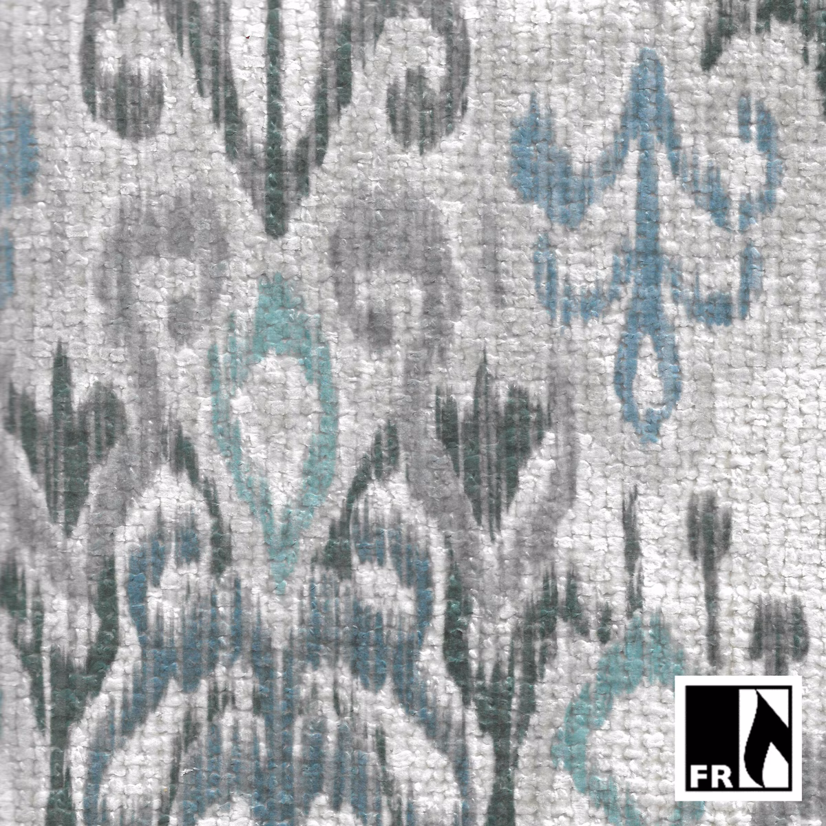 Pale granite-grey woven ground with charcoal, teal and green ikat motifs