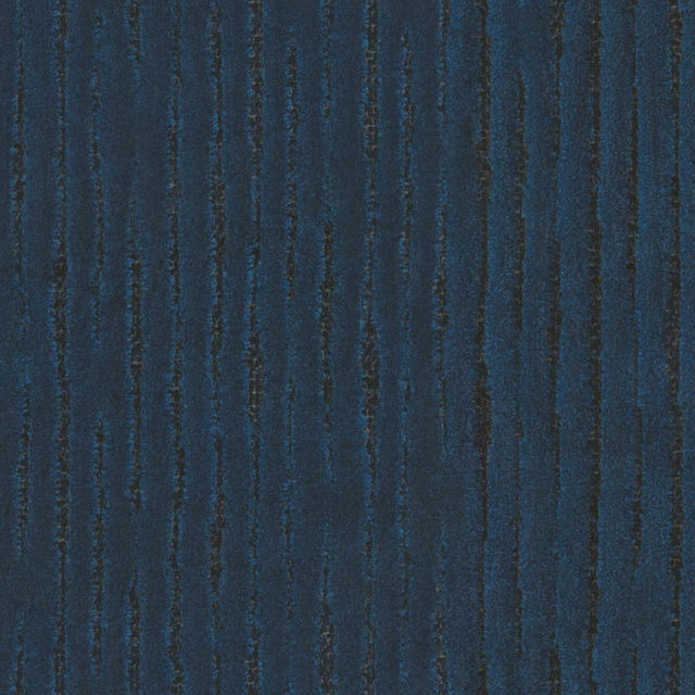 Deep sapphire-blue fabric with irregular dark vertical striations and a softly ridged surface
