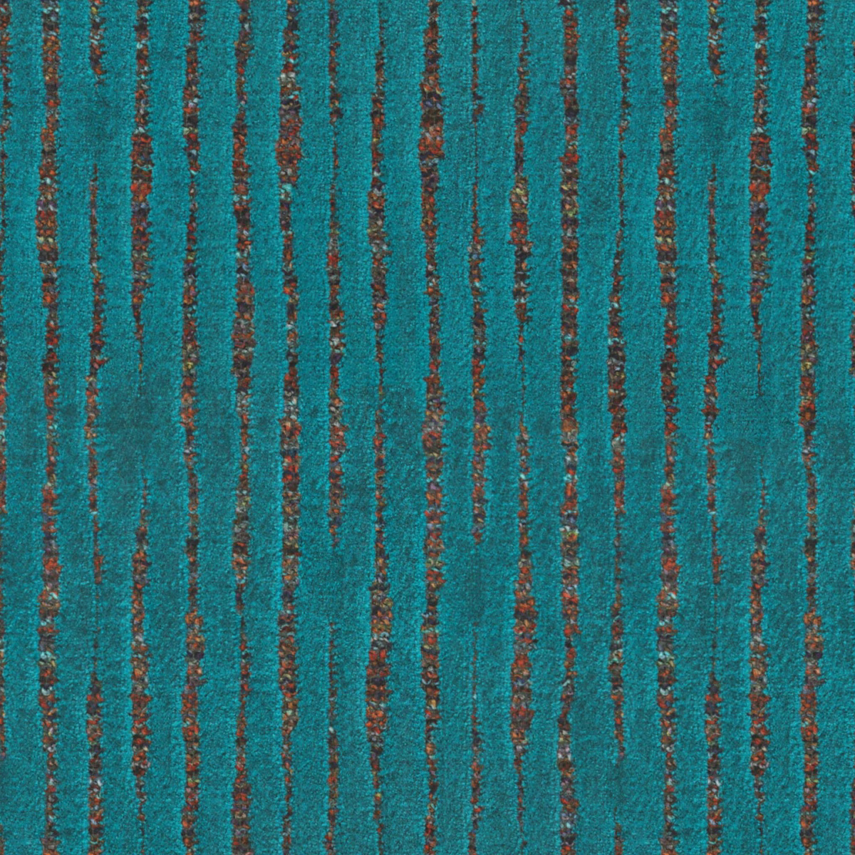 Close-up of peacock teal textile with irregular rust-brown vertical streaks