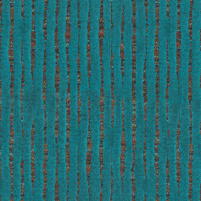 Close-up of peacock teal textile with irregular rust-brown vertical streaks
