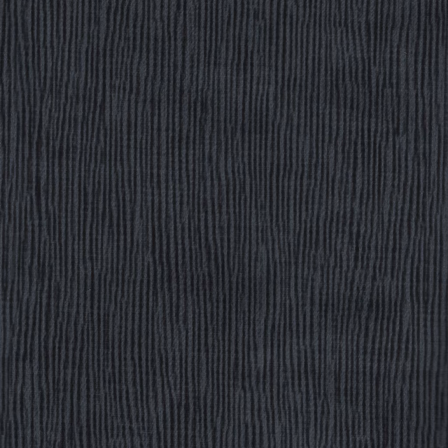 Deep navy fabric with narrow, uneven vertical ribs and a low-sheen woven surface