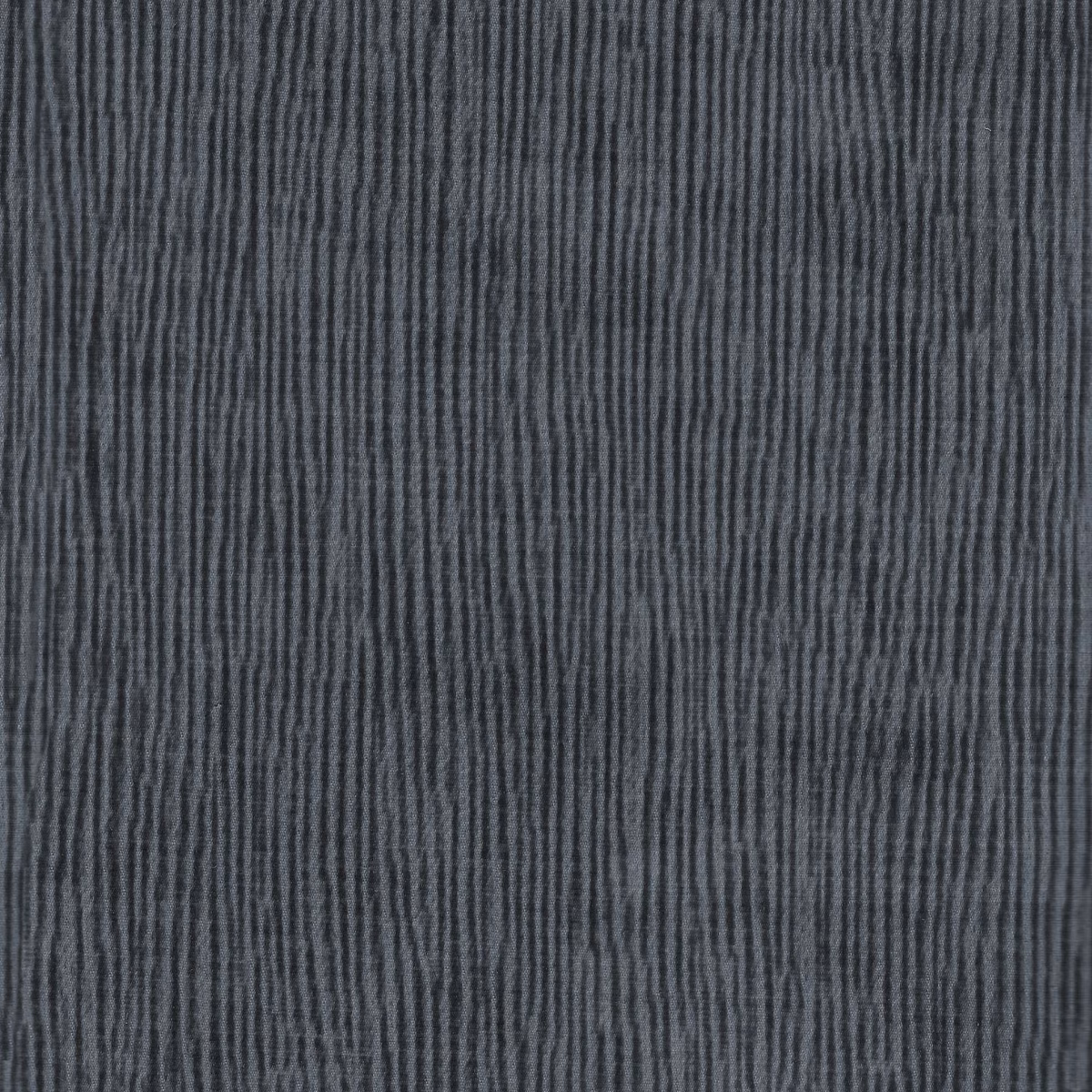 Deep slate-blue fabric with fine irregular vertical striations and a subtly ridged weave