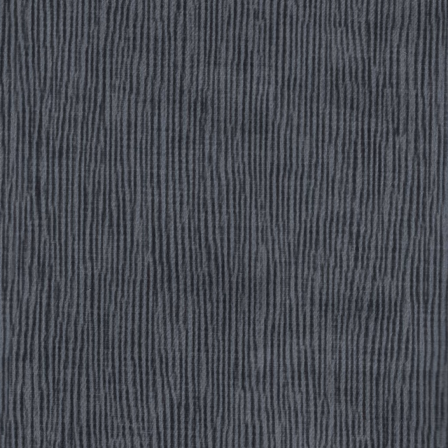 Deep slate-blue fabric with fine irregular vertical striations and a subtly ridged weave