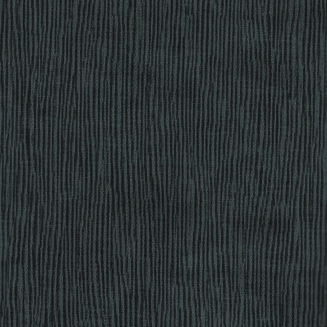 Close-up of deep teal fabric with fine, irregular vertical ribbed texture