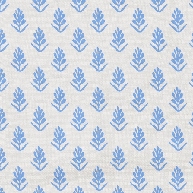 Light cream ground with repeated soft cornflower-blue leafy sprigs and fine weave