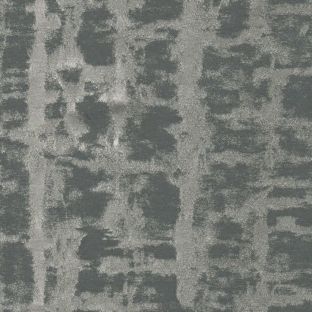 Close view of cool ash-grey woven fabric with irregular charcoal-grey blocks