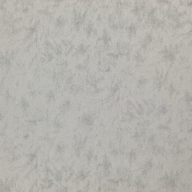 Pale metallic-grey fabric with smoky mottling and a softly textured surface