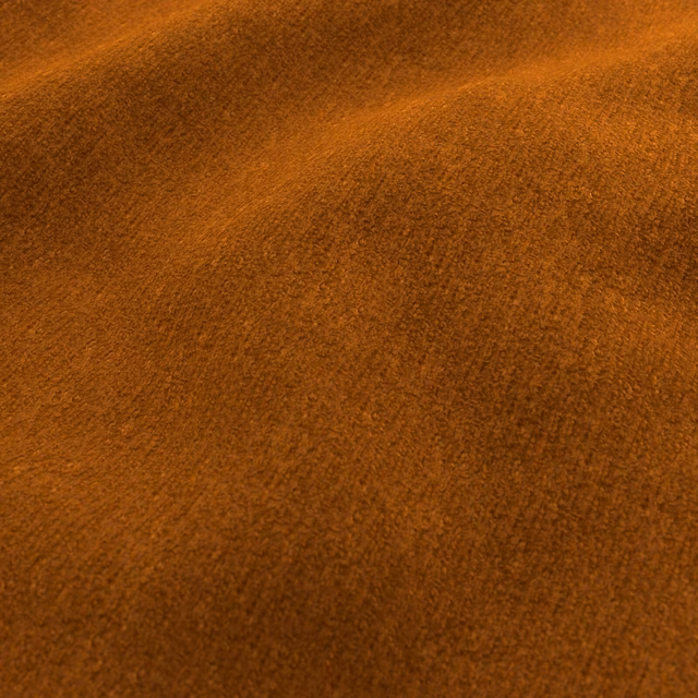 Warm ginger-brown plush fabric with a softly brushed, directional pile