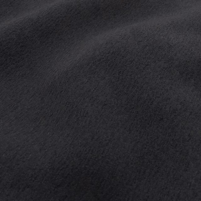 Close-up of deep black Teddy fabric showing a soft, brushed pile