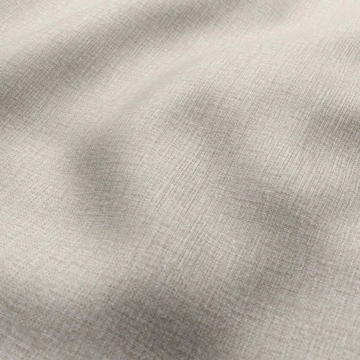 Pale warm greige fabric with fine crosswoven texture and softly shaded folds