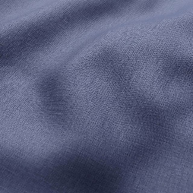Muted blue-grey woven surface with fine crosshatching and soft tonal shading
