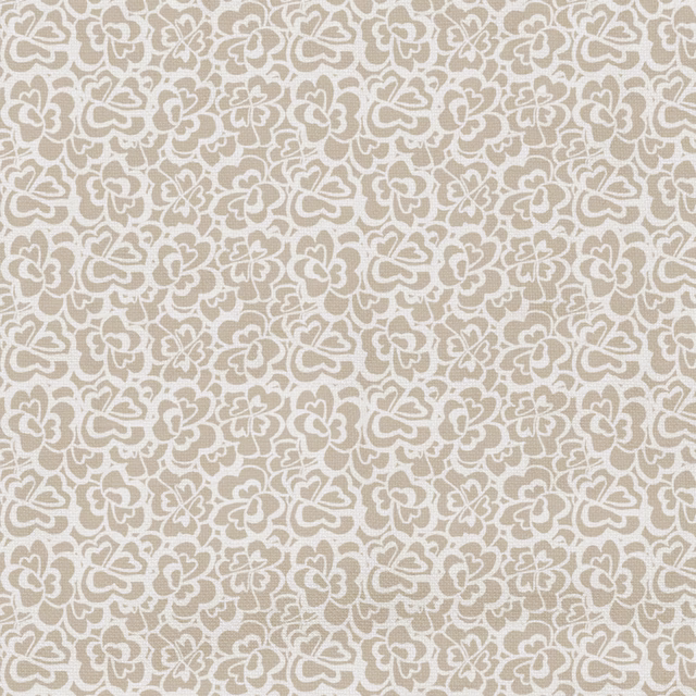 Warm toffee-taupe fabric with dense cream floral outlines and woven texture