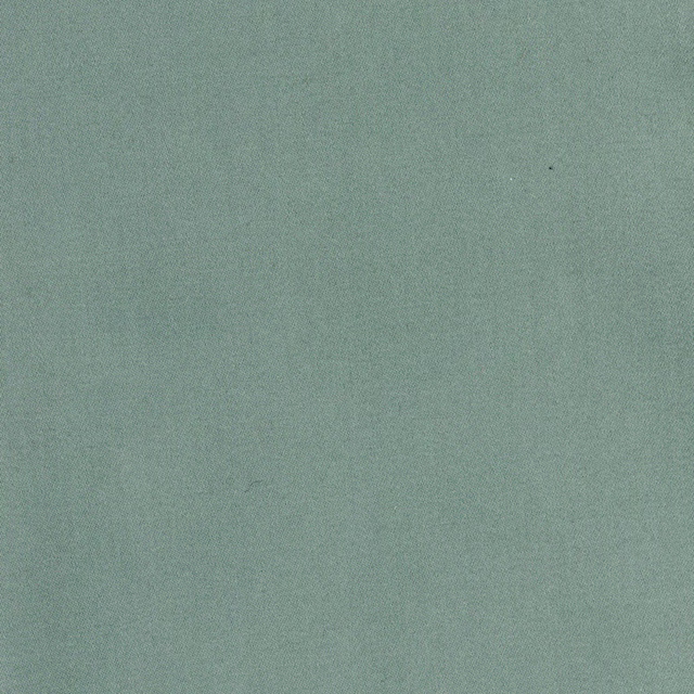 Muted sea-green teal fabric with a fine, even woven surface